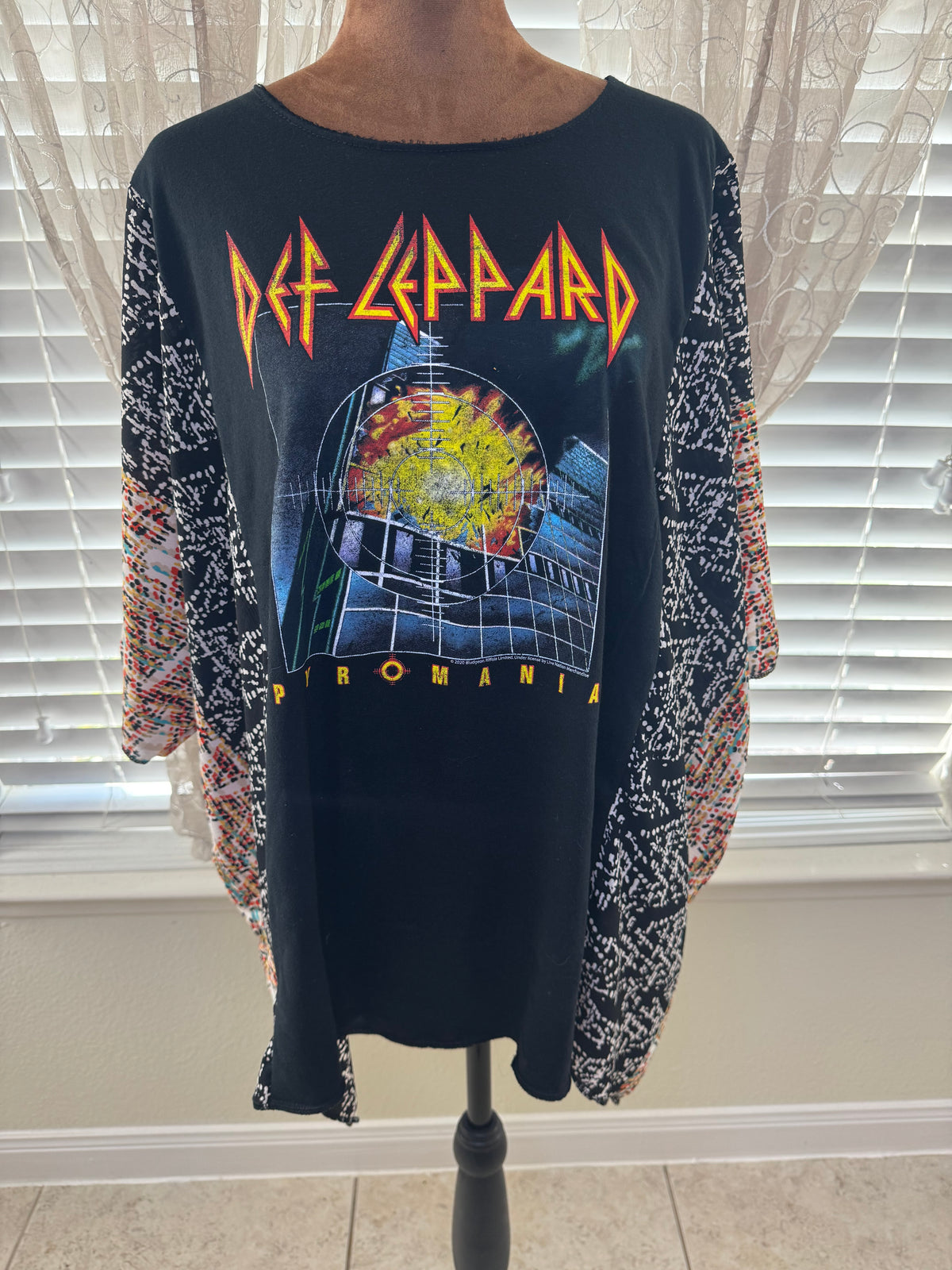"Def Leppard" Black T-Shirt with multicolor sheer sleeves.  One Size Fits S-2X