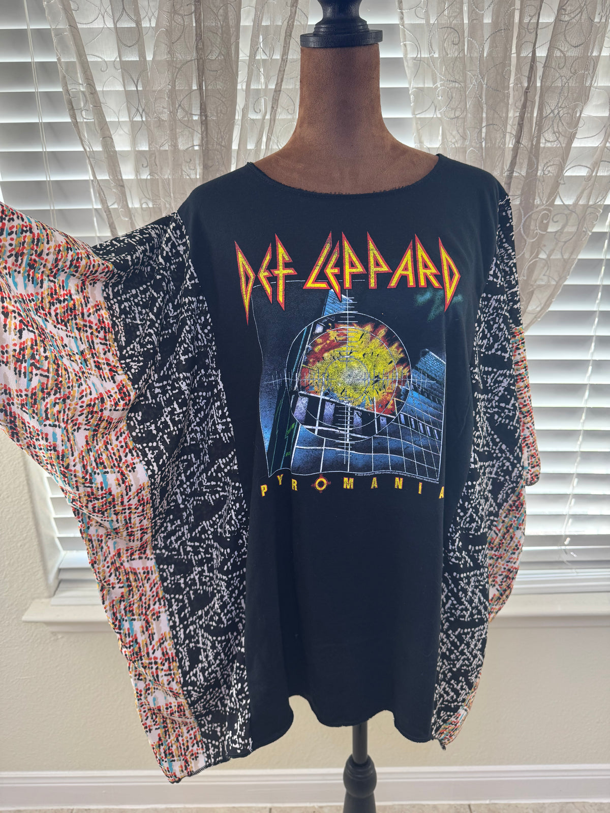 "Def Leppard" Black T-Shirt with multicolor sheer sleeves.  One Size Fits S-2X