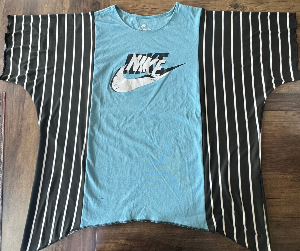 "NIKE" Light Blue T-Shirt with Black/White accents.  One Size Fits S-2X