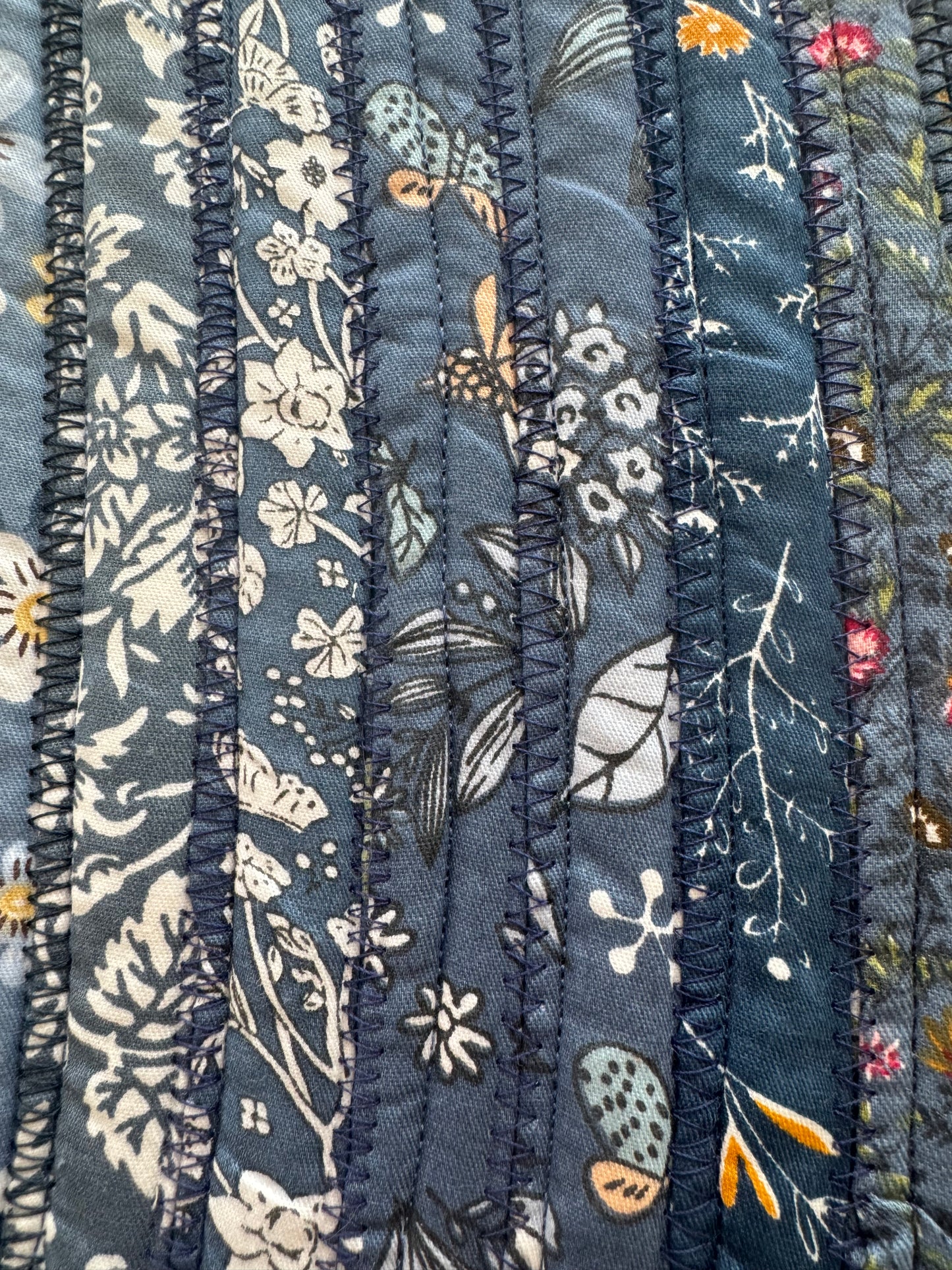 Moody Blues Medium Jelly Roll Rug.