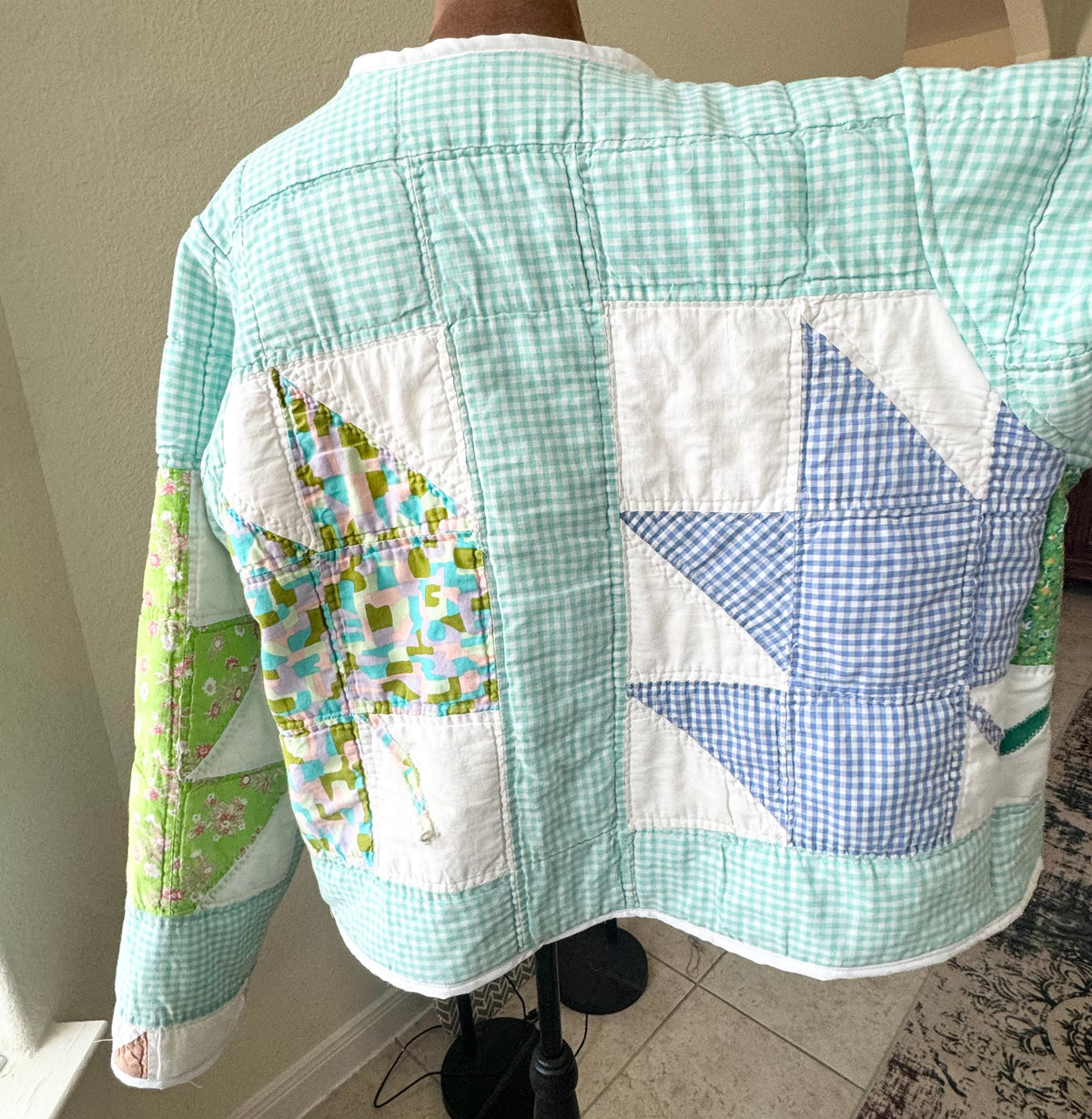 Checkered Leaf pattern quilted jacket.  Waist length. Size L