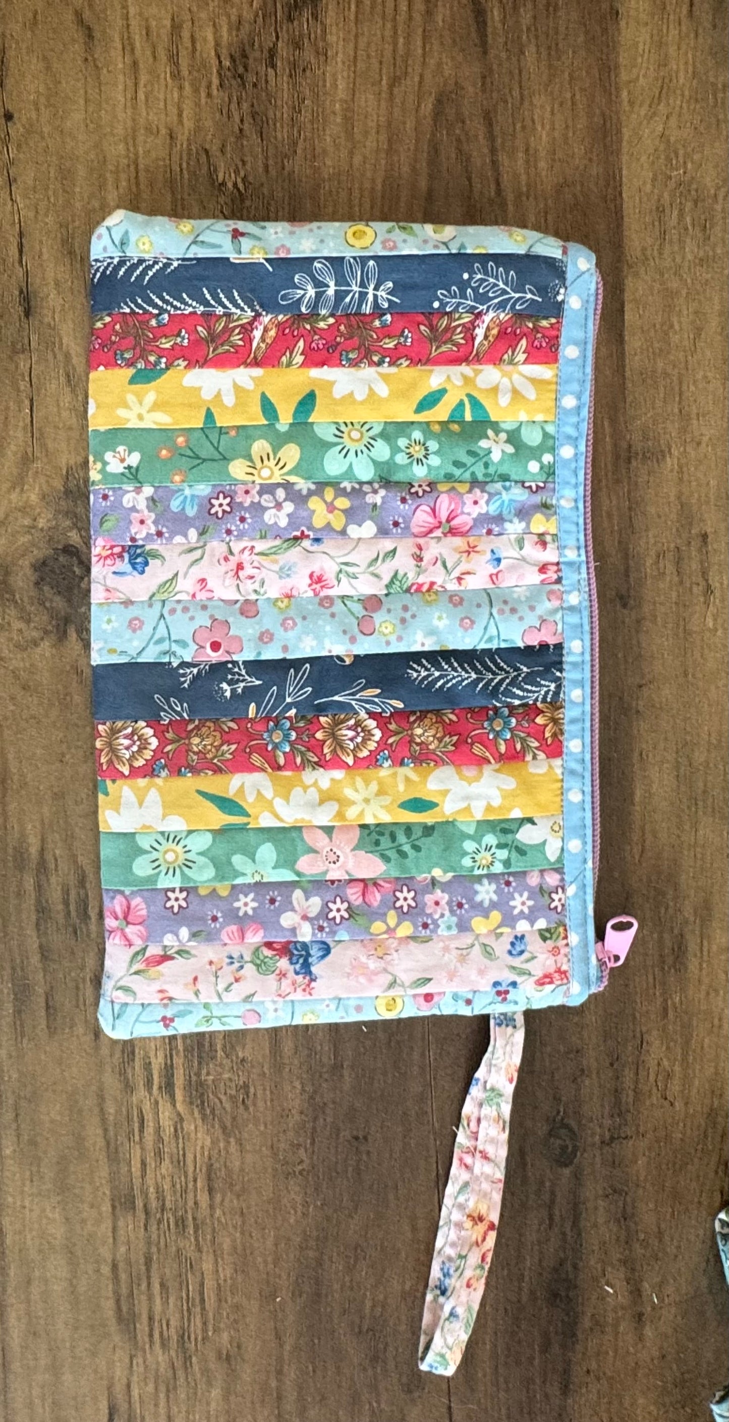 Multicolored Quilted Flower Wristlet.  10" w x 6" t