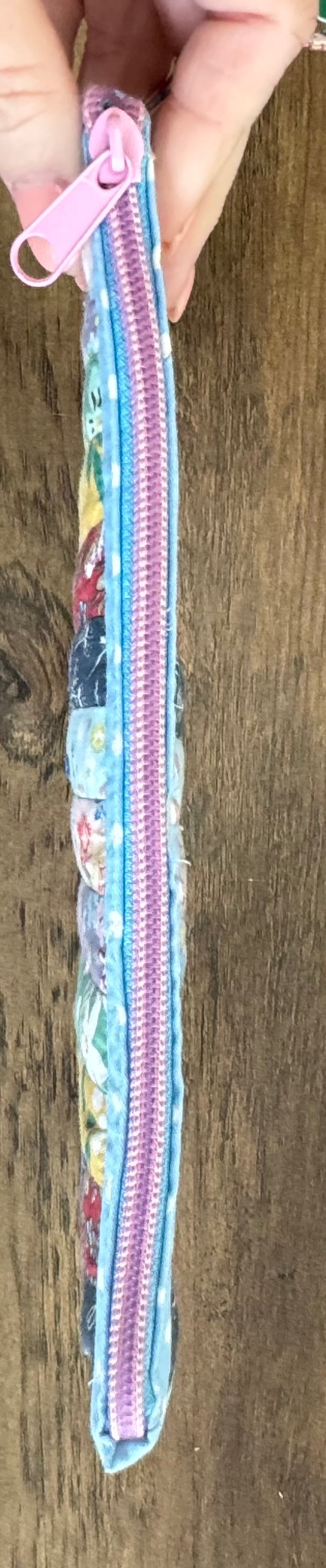 Multicolored Quilted Flower Wristlet.  10" w x 6" t