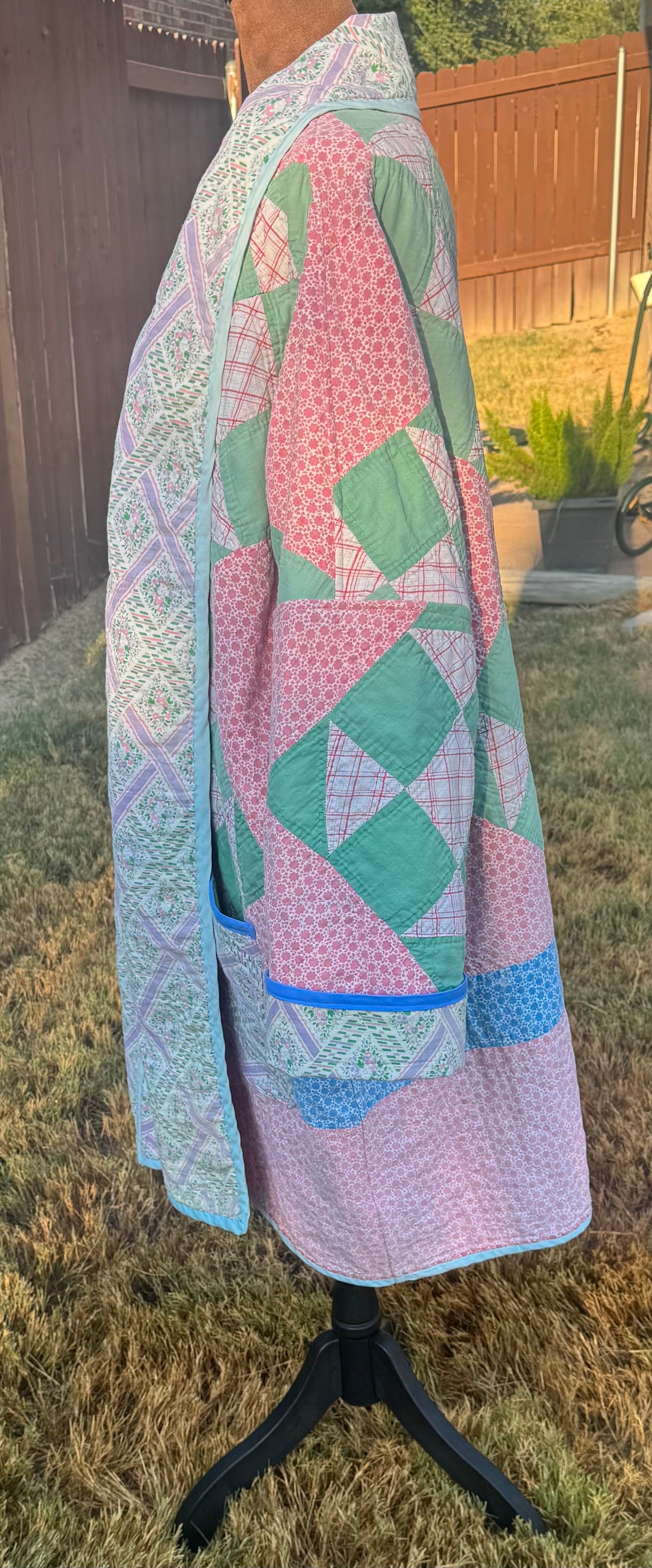Vintage quilted 3/4 length jacket with beautiful pinks and greens.