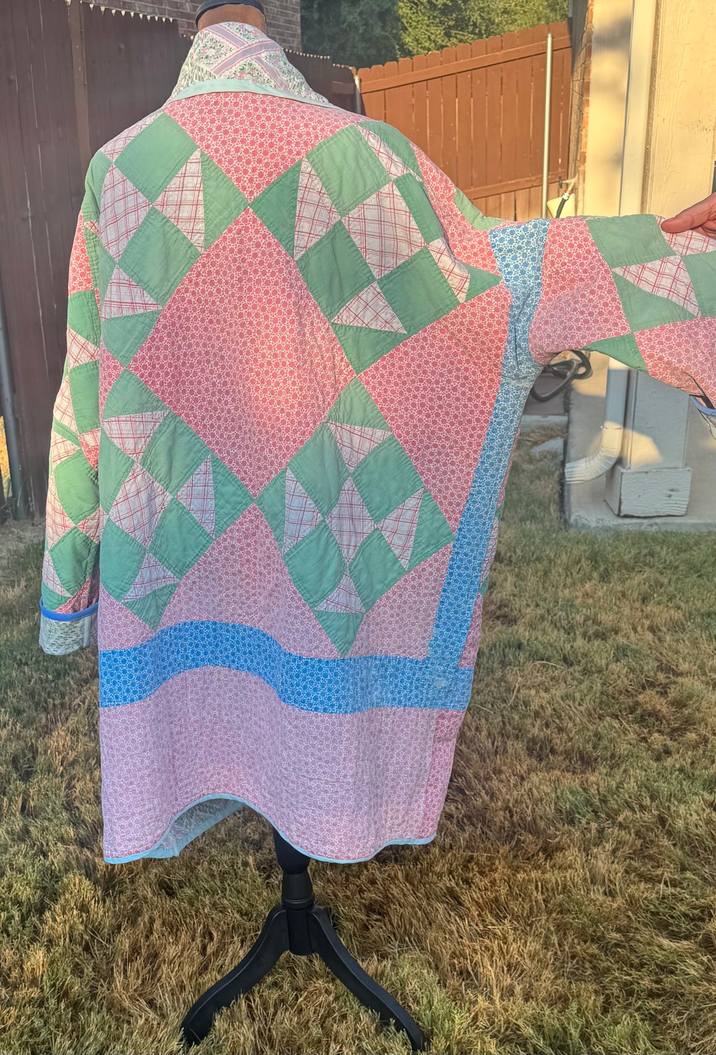 Vintage quilted 3/4 length jacket with beautiful pinks and greens.