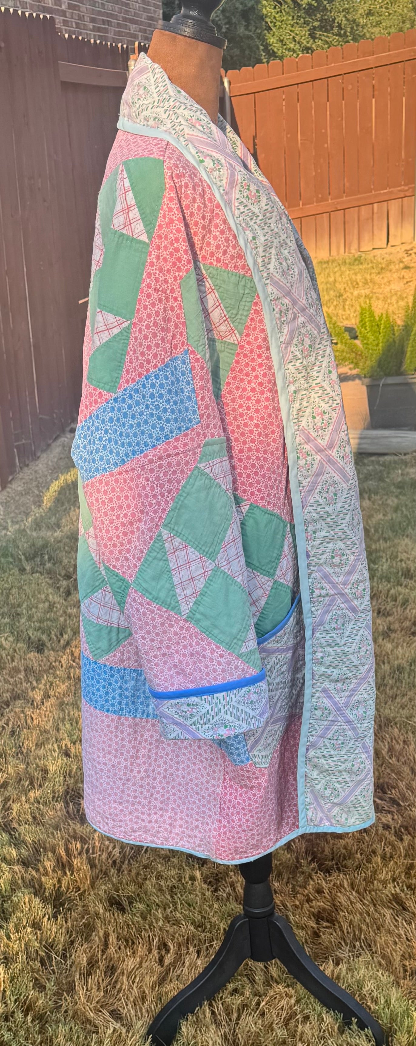 Vintage quilted 3/4 length jacket with beautiful pinks and greens.