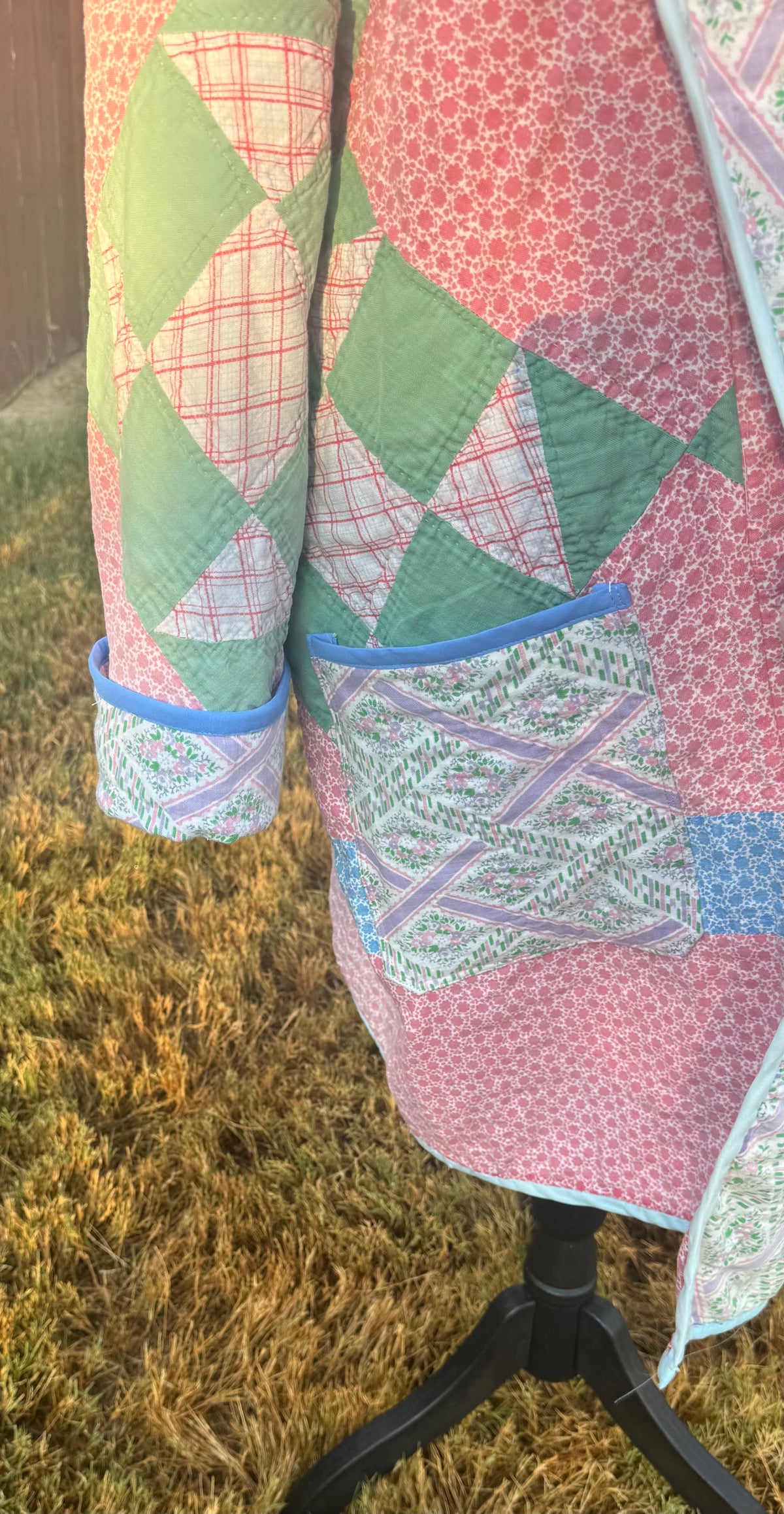 Vintage quilted 3/4 length jacket with beautiful pinks and greens.