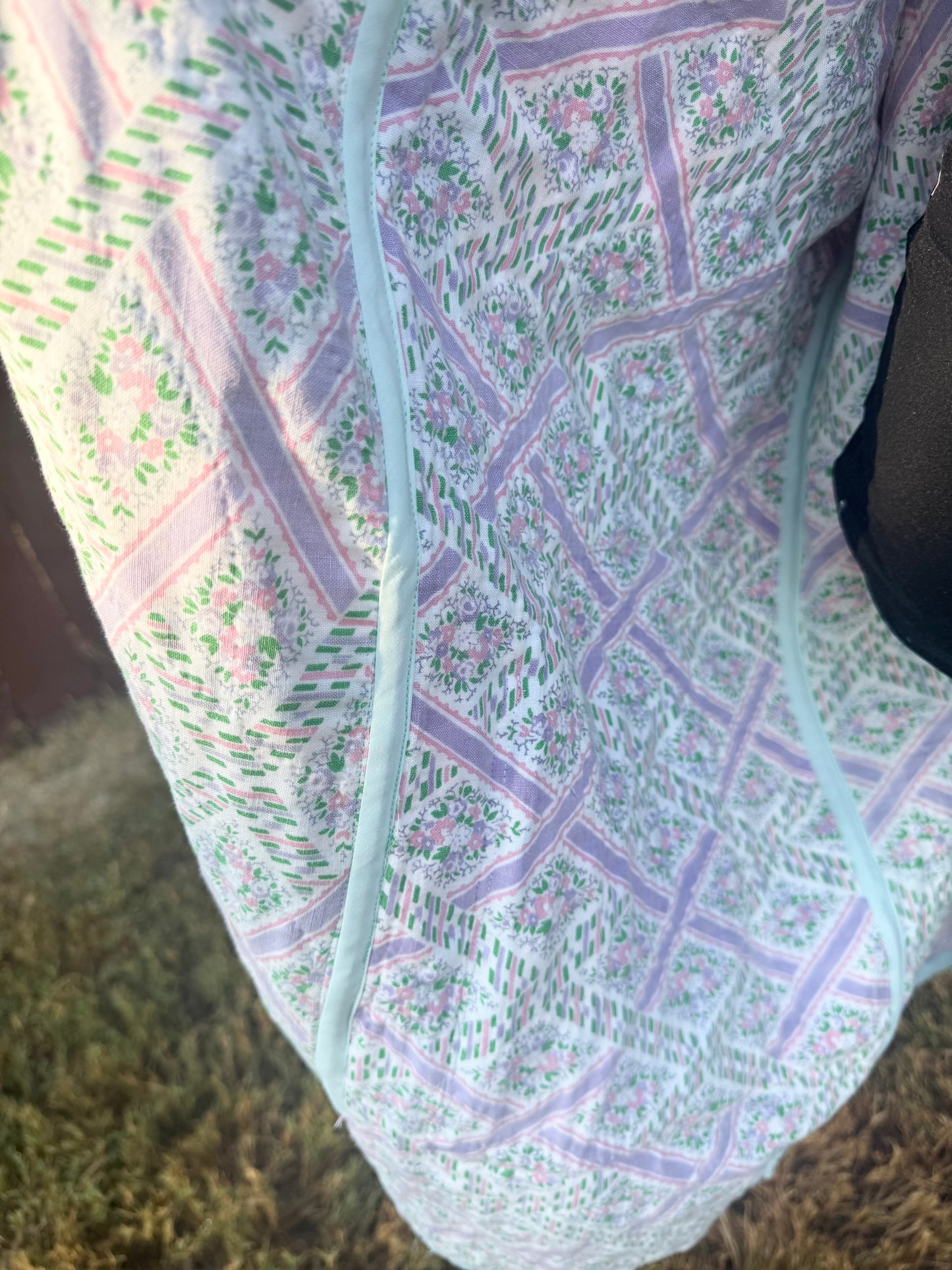 Vintage quilted 3/4 length jacket with beautiful pinks and greens.