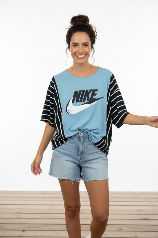 "NIKE" Light Blue T-Shirt with Black/White accents.  One Size Fits S-2X