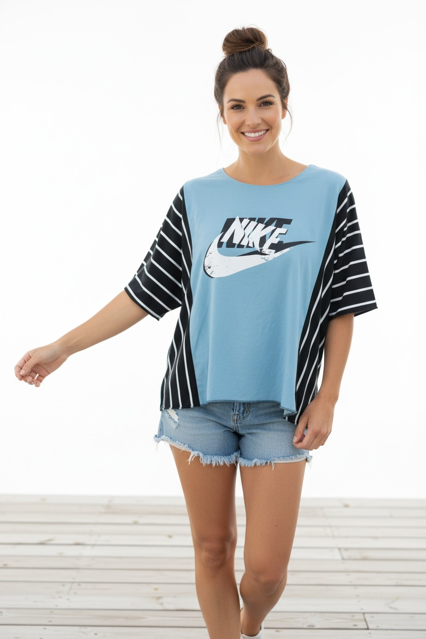 "NIKE" Light Blue T-Shirt with Black/White accents.  One Size Fits S-2X